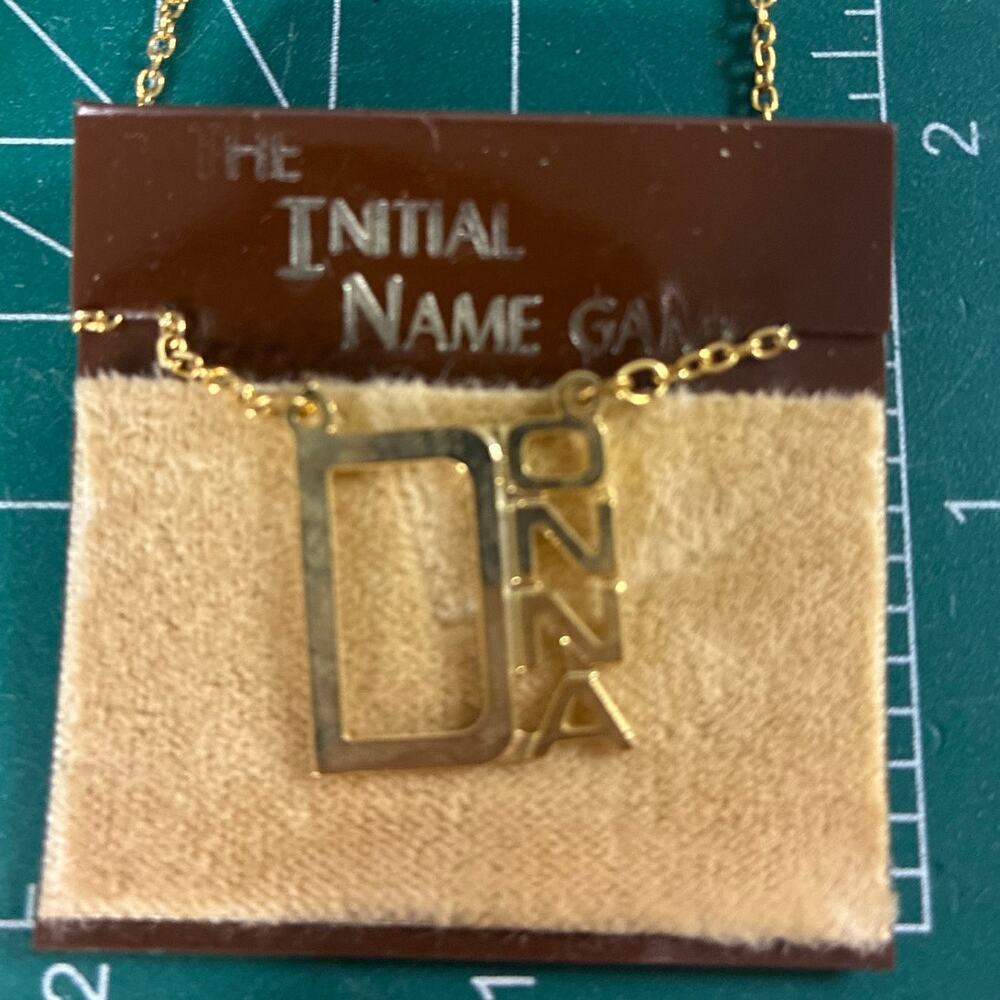 The Initial Name Game DONNA vintage gold tone necklace